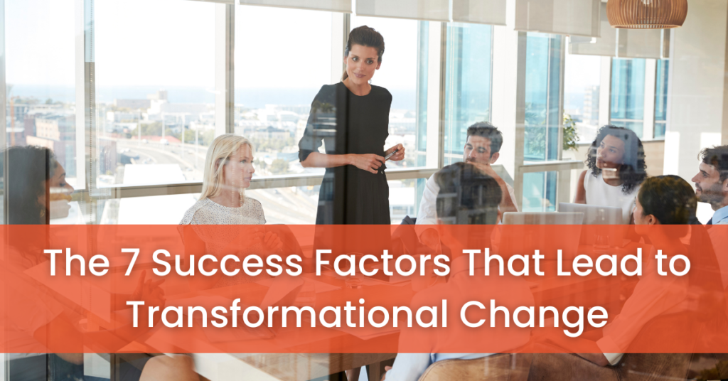 Business woman wearing a black dress talking to a group of professionals in a board room with the text "The 7 Success Factors That Lead To Transformational Change" layered on top of an orange background.